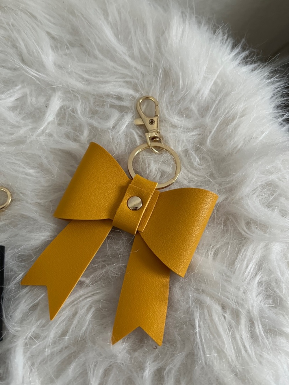 NWOT Gold Leather Bow Keychain